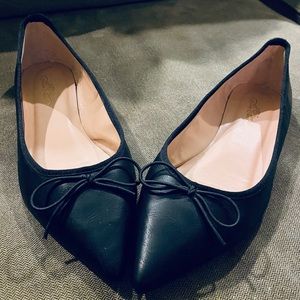 Black pointed toe flats
